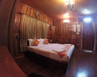 Palm House Boutique and Spa - 白马 - 睡房