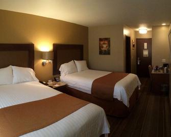 The East Avenue Inn & Suites - 罗切斯特 - 睡房