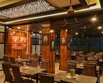 罗玛纳大楼酒店 - 蒂鲁文纳默莱 - 餐馆