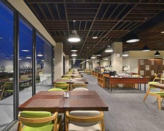 巴东卡提素莱曼威兹普莱姆酒店 - 巴东 - 餐馆