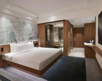 孟买珠瑚海滩诺富特酒店 - 孟买 - 睡房