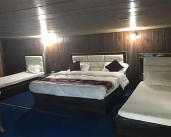 雪景小屋酒店 - 奈尼塔尔 - 睡房