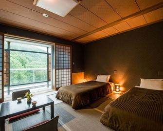 高见屋琉璃俱乐度假区 - 山形市 - 睡房