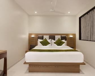 住宅公园酒店 - 孟买 - 睡房