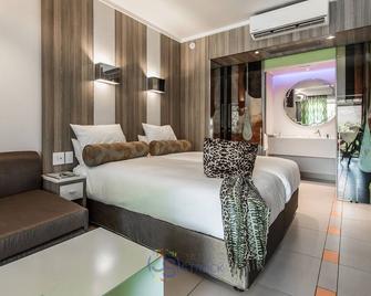太阳城度假村小屋酒店 - Sun City Resort - 睡房