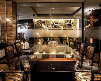 托波洛奇公寓酒店 - 圣克鲁斯 - 餐馆