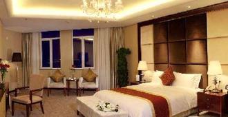 內蒙古興泰國航酒店 - 呼和浩特 - 睡房