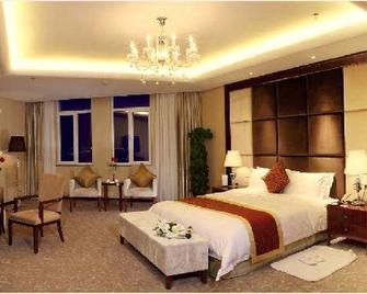 內蒙古興泰國航酒店 - 呼和浩特 - 睡房