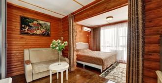 胡托羅科酒店 - 伏尔加格勒 - 睡房
