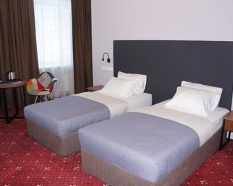 Sky hotel - 秋明 - 睡房