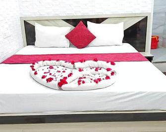 斯瓦斯蒂克酒店 - Deoghar - 睡房