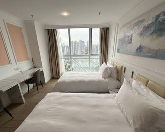 华美国际酒店 - 上海 - 睡房