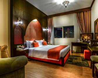 第一中心公寓式酒店 - 迪拜 - 睡房