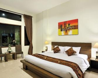 巴厘岛甘加公寓酒店 - 登巴萨 - 睡房