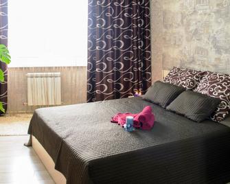 Jacuzzi Vip Smart Aparthotel - 明斯克 - 睡房
