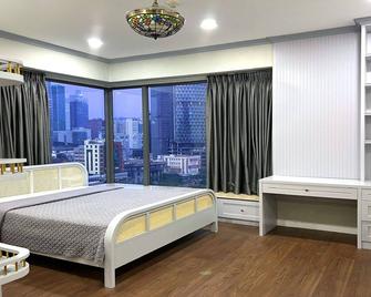 阳光西贡公寓及酒店 - 胡志明市 - 睡房