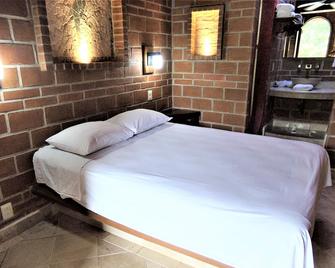 Hotel Casa de Lirio Diamante - 阿卡普尔科 - 睡房