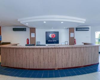 Capital O 89876 Safari Hotel - 邦咯 - 柜台