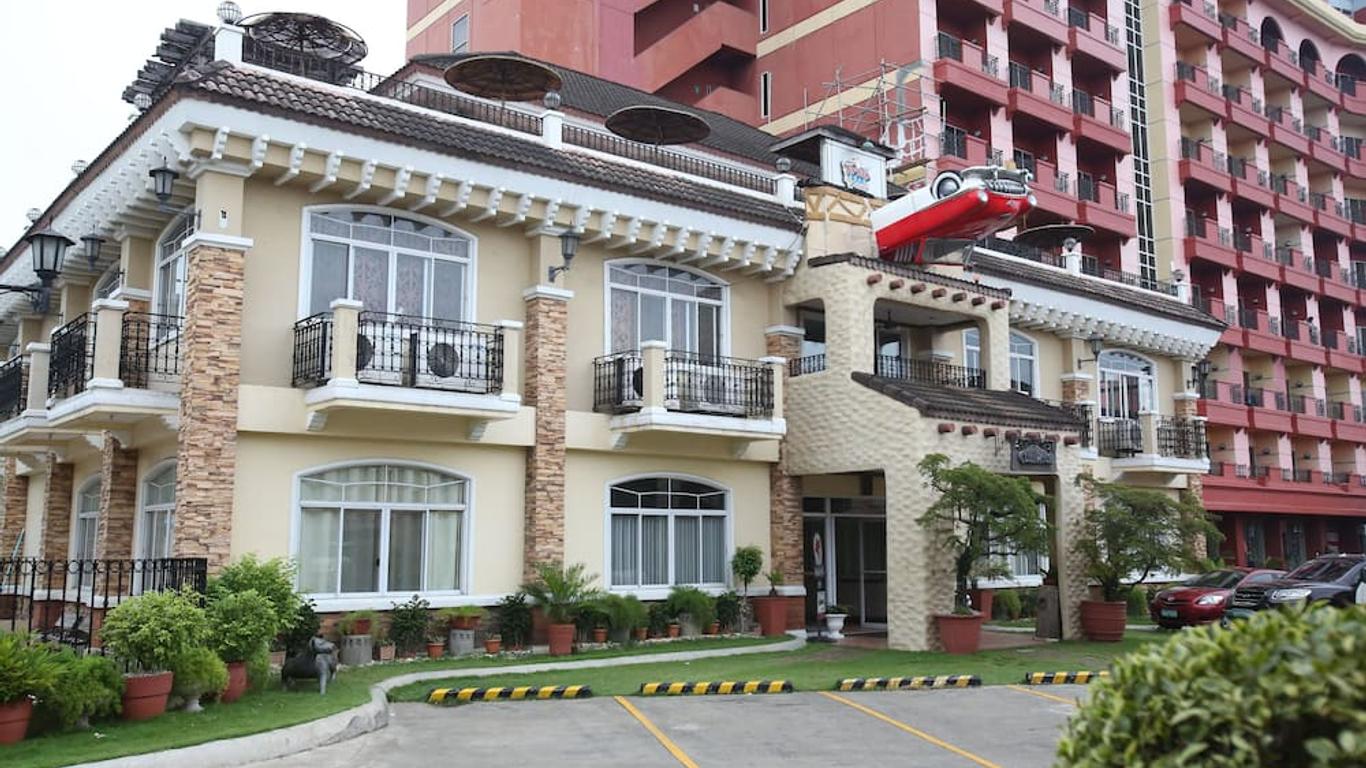 麦克坦皇冠丽晶套房酒店