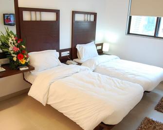Sapphire Regency Hotel - 瓦多达拉(巴罗达) - 睡房