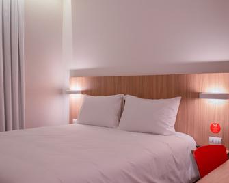 Hotel Moov Porto Alegre(摩夫波尔图阿雷格尔酒店) - 阿雷格里港 - 睡房