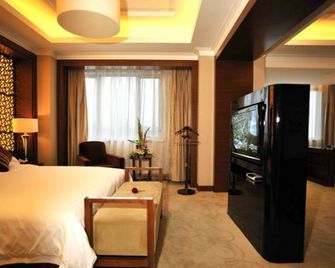花园国际大酒店 - 扬州 - 睡房