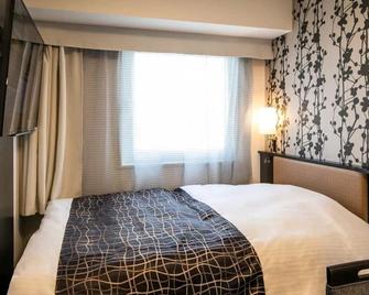 湘南第一 INN 酒店 - 藤泽市 - 睡房