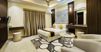 Al Nakheel 酒店公寓 - 拉斯海玛 / 哈伊马角 - 睡房
