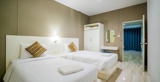 帕拉贡家庭式酒店 - 素叻 - 睡房