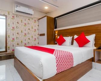 孟买亚马住宿酒店 - 孟买 - 睡房