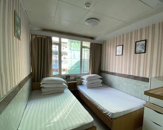住游行渡假宾馆 - 香港 - 睡房