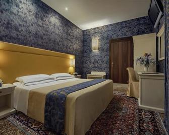 卡布拉加丁卡拉巴酒店 - 威尼斯 - 睡房