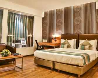 T24住宅酒店 - 孟买 - 睡房
