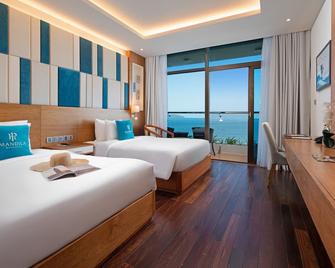 岘港曼迪拉海滩酒店 - 岘港 - 睡房
