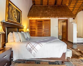 Royal Bakoena Lodge - Hamilton Parks - 雾观 - 睡房