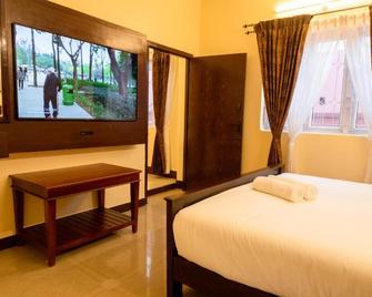 Aakash Rooms and Cottages, - 乌蒂 - 睡房