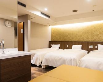 名古屋王冠酒店 - 名古屋 - 睡房
