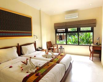 巴厘岛苏利温泉度假酒店 - 吉安雅 - 睡房