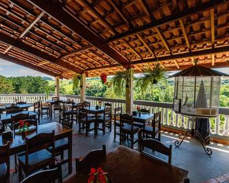 Hotel Morro De Santo Agostinho - 阿瓜斯-迪林多亚 - 餐馆