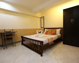 Roger's Place Hotel - Pasay - 睡房