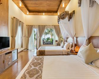 富国岛黄金海岸度假酒店 - Phu Quoc - 睡房