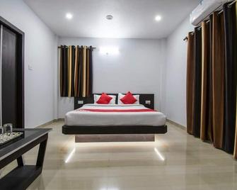 Family Room 9-S G International - 巴特那 - 睡房