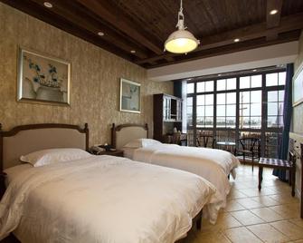 Villa Inn No 30 Seaside - 青岛 - 睡房