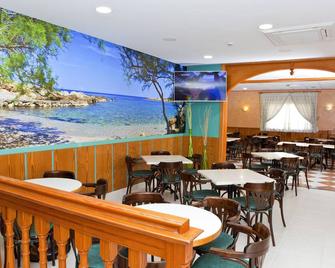 索尔海滩酒店 - 埃尔阿雷纳尔 - 餐馆