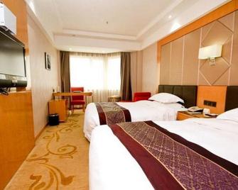 Nanlin International Hotel - 西安 - 睡房
