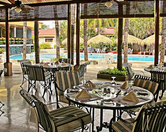 皇家卡米诺马拿瓜全球酒店 - 馬拿瓜 - 餐馆