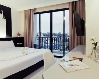 The Proud Hotel - 乌汶 - 睡房