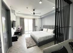 Bedchambers Serviced Apartments, Mg Road - 古尔冈 - 睡房