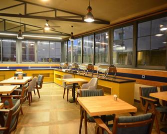 绿洲酒店 - 马尔马里斯 - 餐馆
