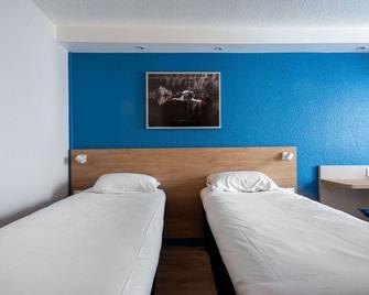 米卢斯中心舒适英式酒店 - 米卢斯 - 睡房